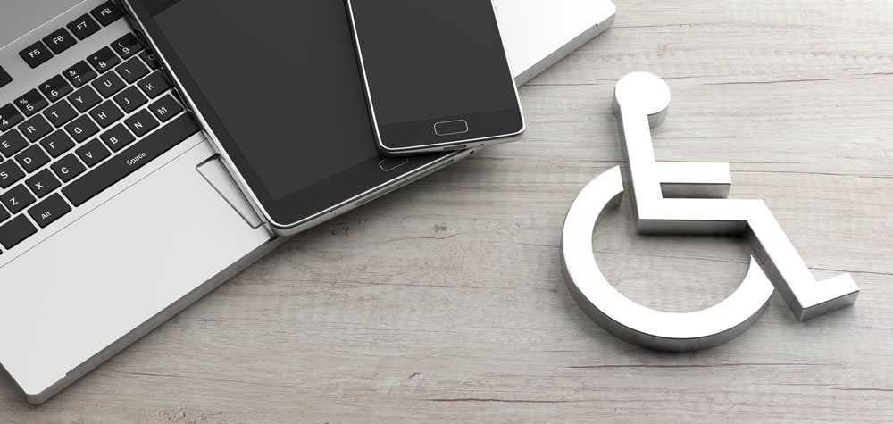 accessibilty Mobile devices stacked on laptop next to disability icon